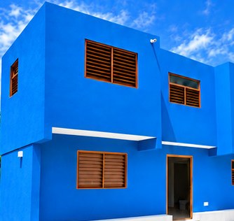 Het blauwe woongebouw van GB20